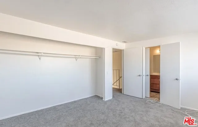a view of room with walk in closet