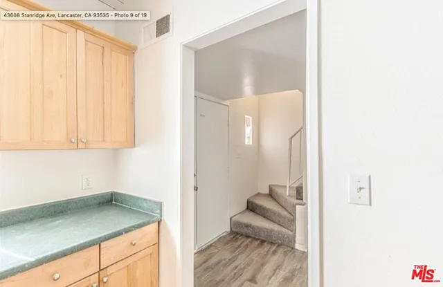 a room with a sink and a window