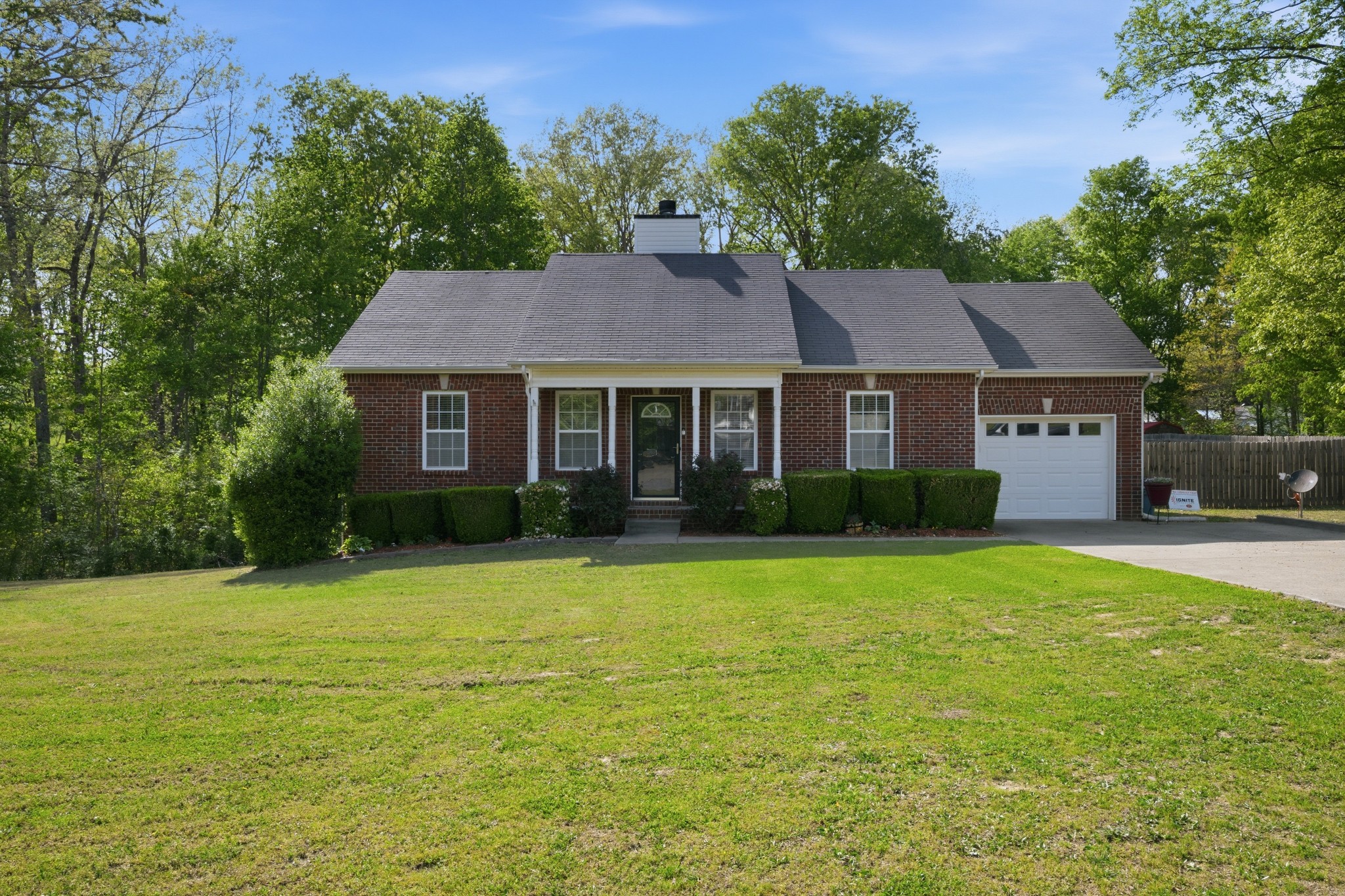 504 Daugherty Lane Burns, TN 37029 - Photo 3 of 30 a front view of a house with a garden
