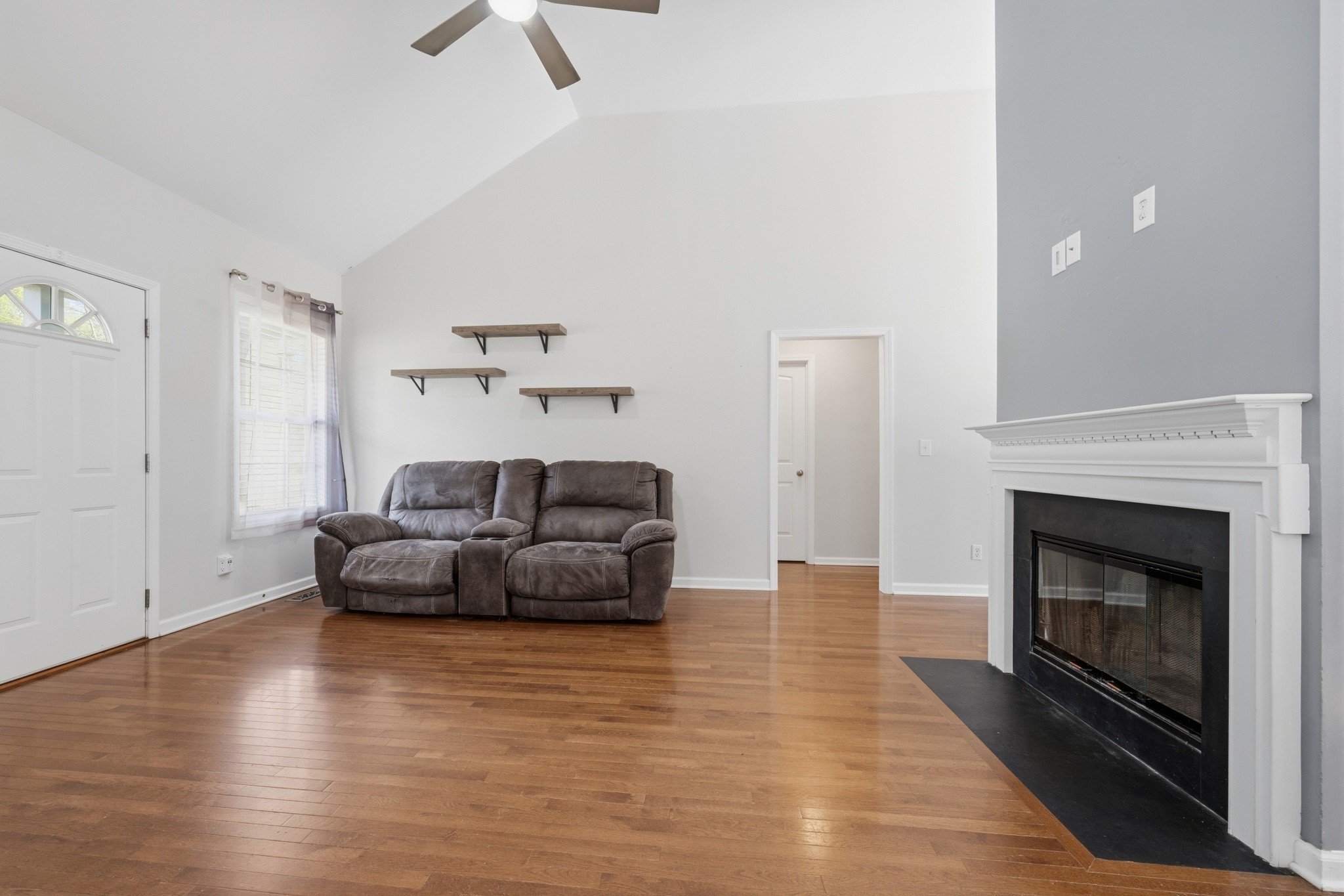504 Daugherty Lane Burns, TN 37029 - Photo 8 of 30 a living room with furniture and a fireplace