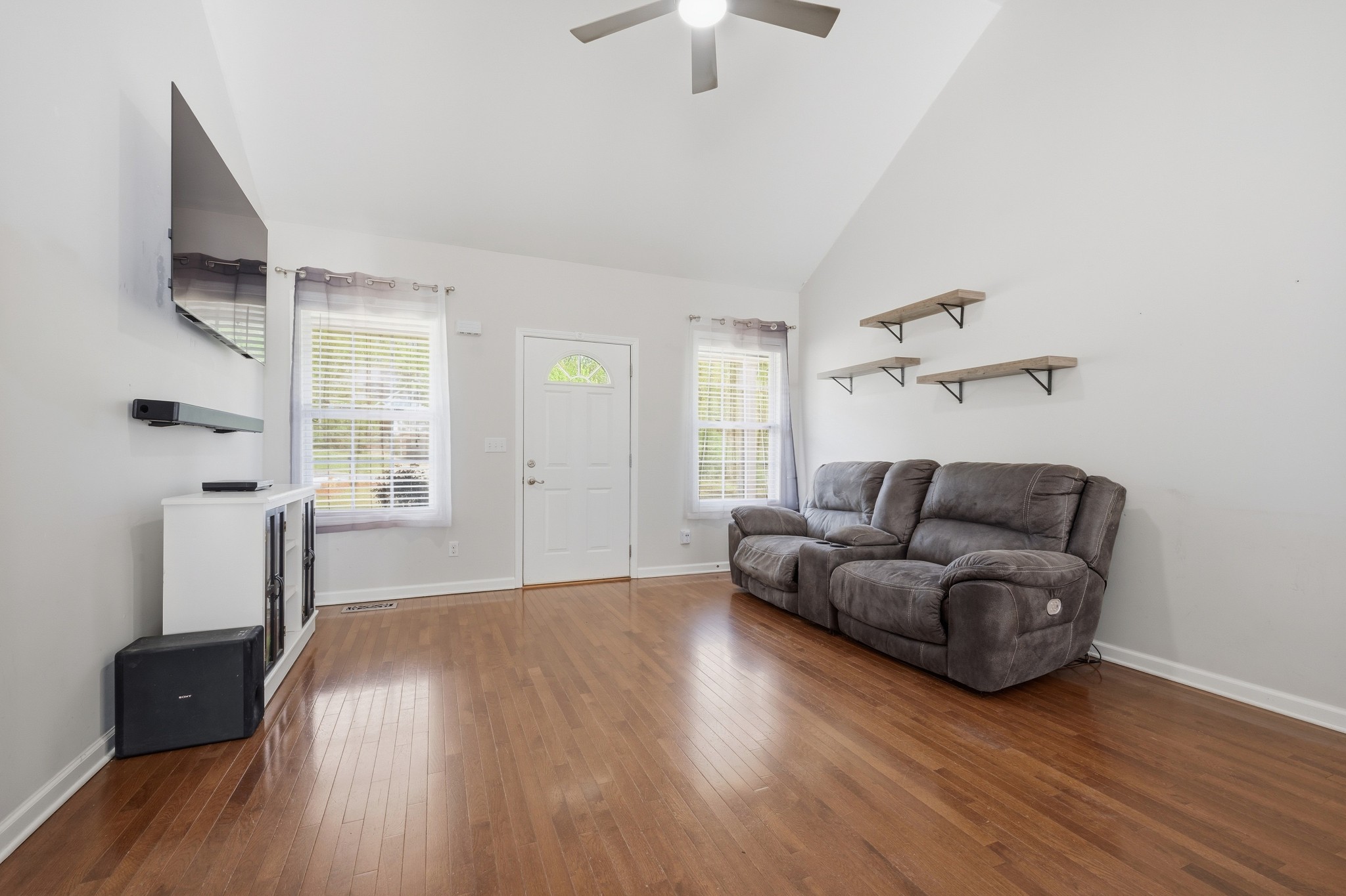 504 Daugherty Lane Burns, TN 37029 - Photo 10 of 30 a living room with furniture and a wooden floor