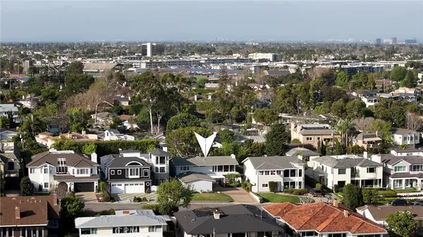 an aerial view of a city with lots of residential buildings