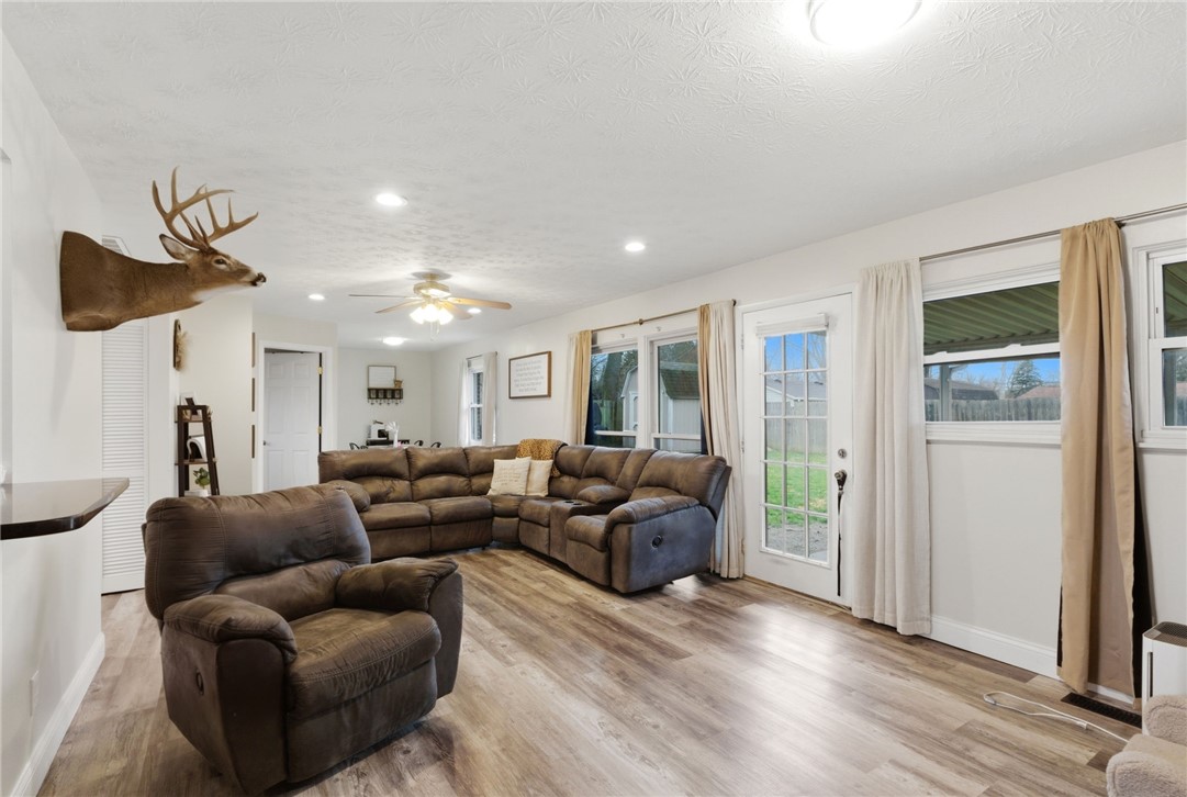 441 Townsend Place Riverside, OH 45431 - Photo 10 of 34 This inviting living area features warm wood-look flooring and abundant natural light.