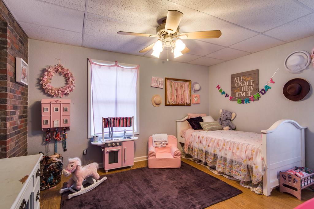 7315 Coldwater Road Fairview, TN 37062 - Photo 22 of 30 a bedroom with a bed and window