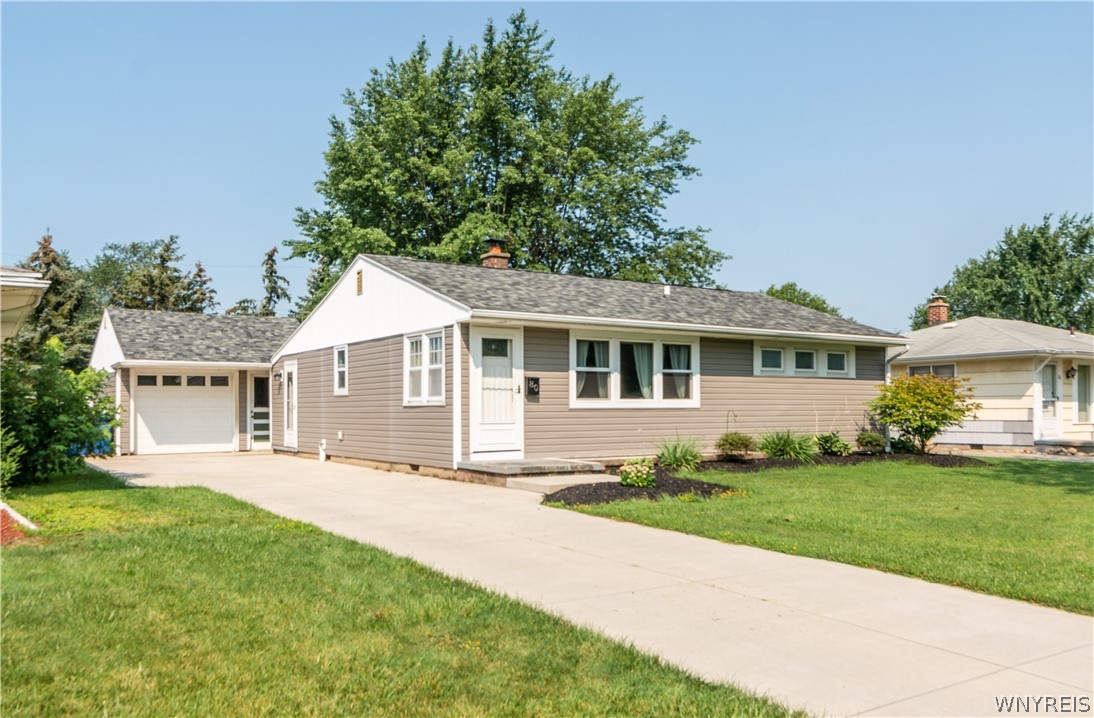 80 Mapleview Drive Amherst, NY 14226 - Photo 2 of 27 Double-wide driveway leading to 1.5 car garage