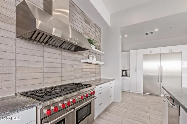 a kitchen with sink and window