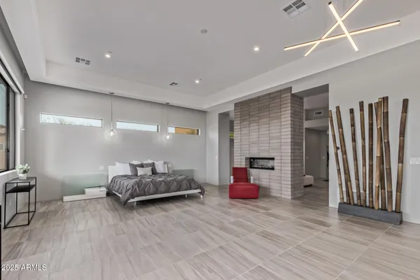 a view of a hallway with wooden floor and glass door