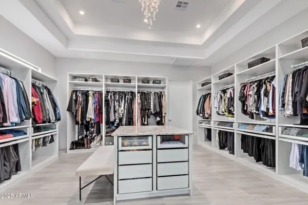 a kitchen with sink cabinets and a window