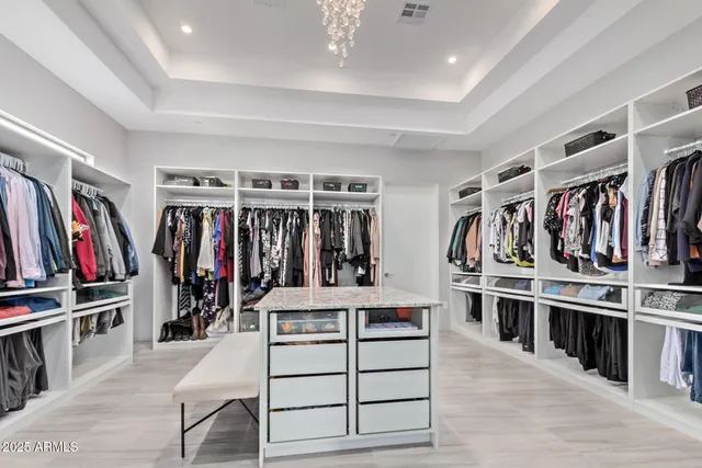 a kitchen with sink cabinets and a window