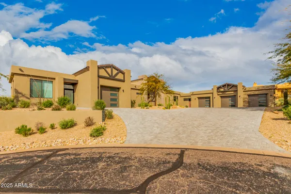 a view of a house with a snow in front of it