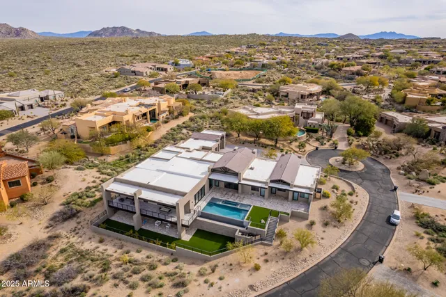 a view of livingroom with furniture and floor to ceiling window