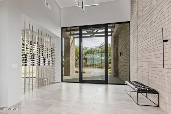 a view of a dining room with furniture window and outside view