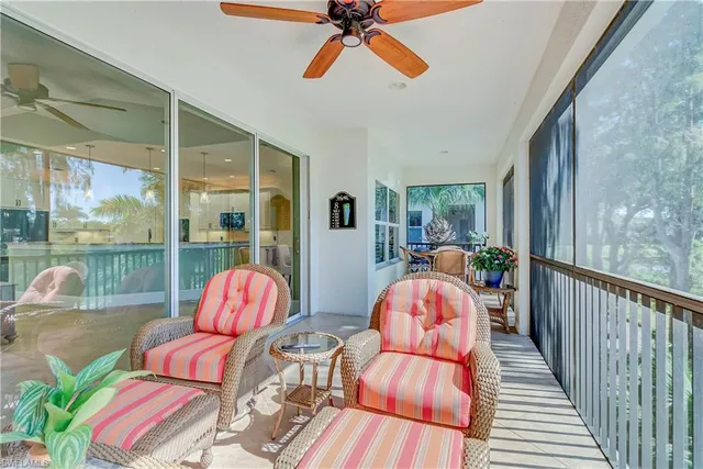 a bathroom with a granite countertop sink a mirror and a shower