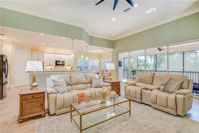 a living room with furniture and a table