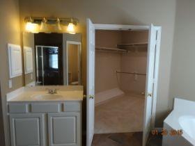 3104 Angus Drive Plano, TX 75025 - Photo 20 of 35 a bathroom with a sink and a mirror