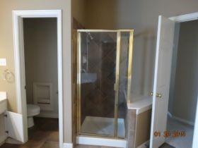 3104 Angus Drive Plano, TX 75025 - Photo 22 of 35 a bathroom with a glass shower door