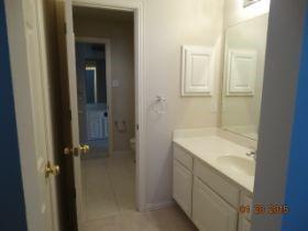 3104 Angus Drive Plano, TX 75025 - Photo 27 of 35 a bathroom with a sink and mirror