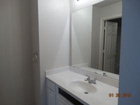 3104 Angus Drive Plano, TX 75025 - Photo 29 of 35 a bathroom with a sink and a mirror