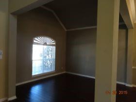 3104 Angus Drive Plano, TX 75025 - Photo 6 of 35 a view of an empty room with wooden floor and a window