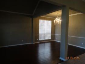 3104 Angus Drive Plano, TX 75025 - Photo 7 of 35 a view of an empty room with wooden floor and a window