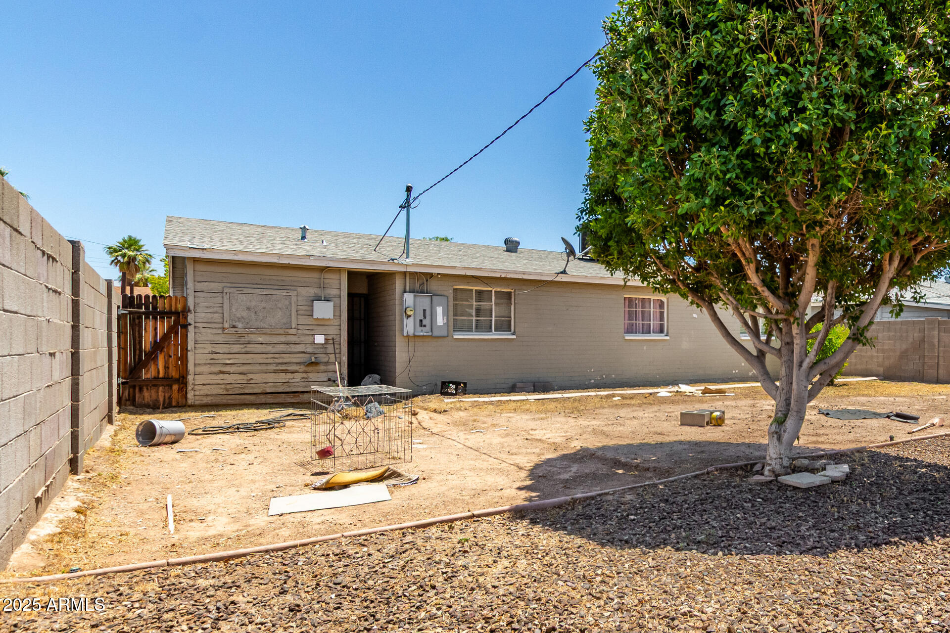 3152 North 24th Drive Phoenix, AZ 85015 - Photo 24 of 28 a view of a house with a yard