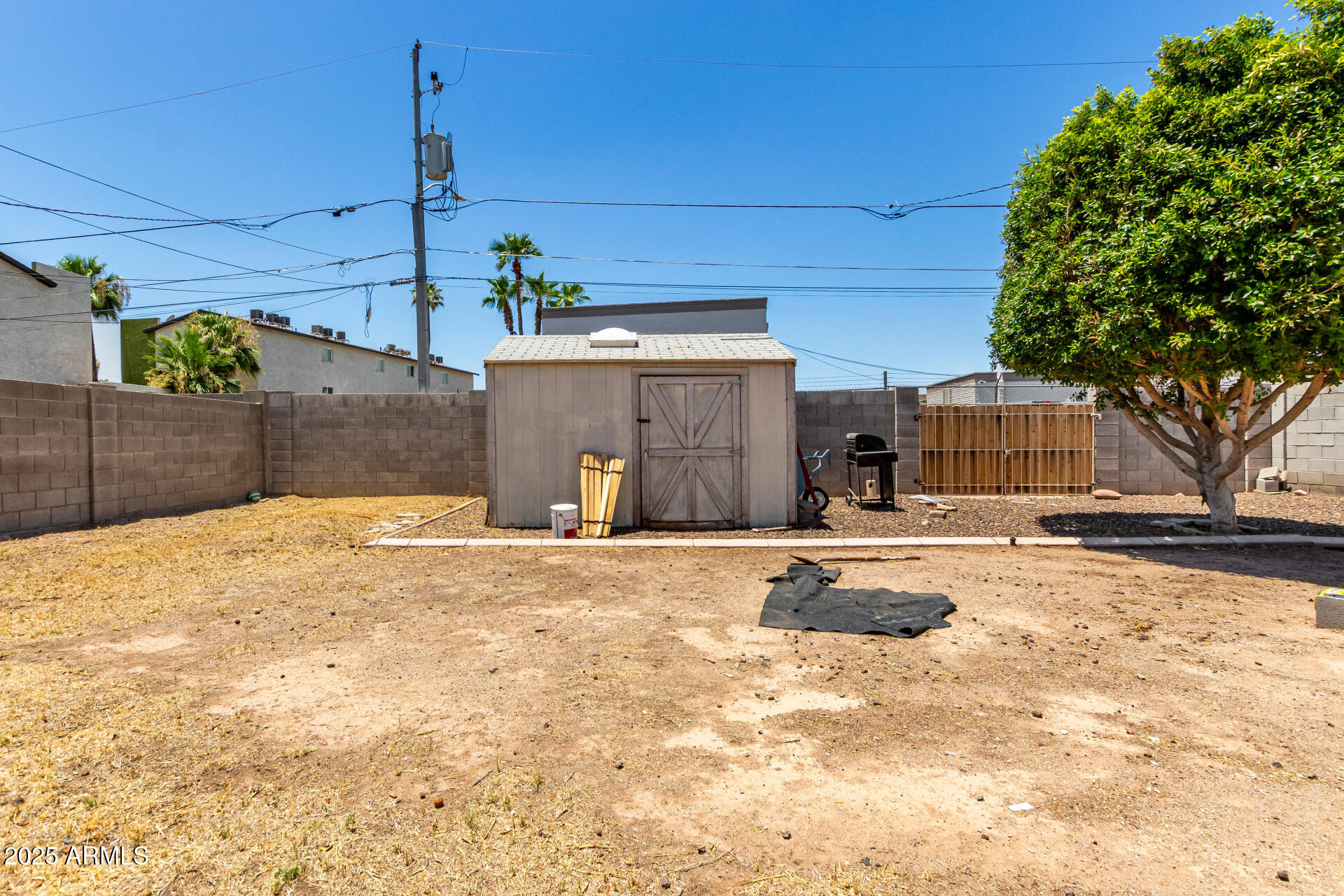 3152 North 24th Drive Phoenix, AZ 85015 - Photo 28 of 28 a swimming pool with yard