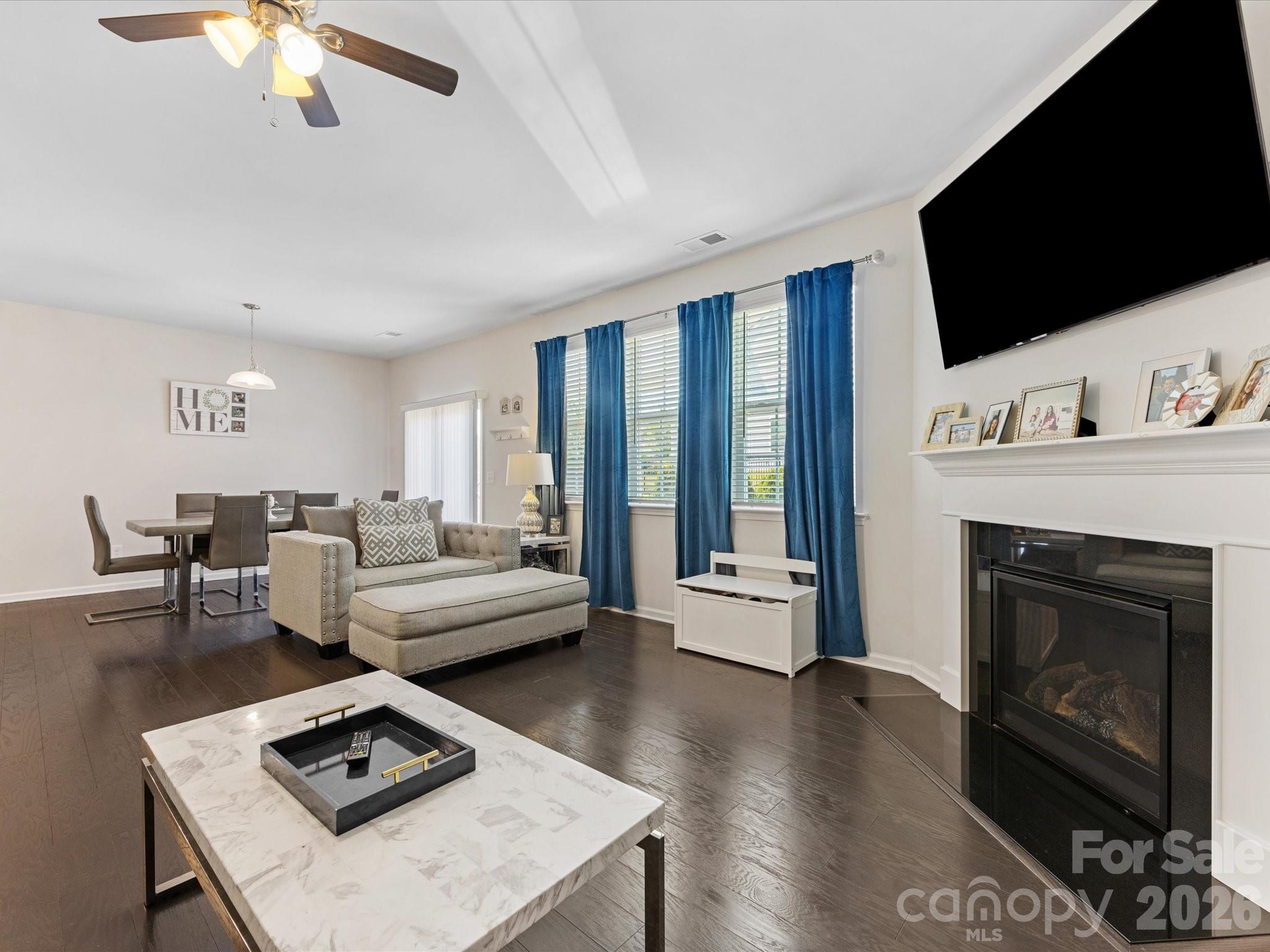 4261 Coachwhip Avenue Lancaster, SC 29720 - Photo 11 of 42 a living room with furniture fireplace and flat screen tv
