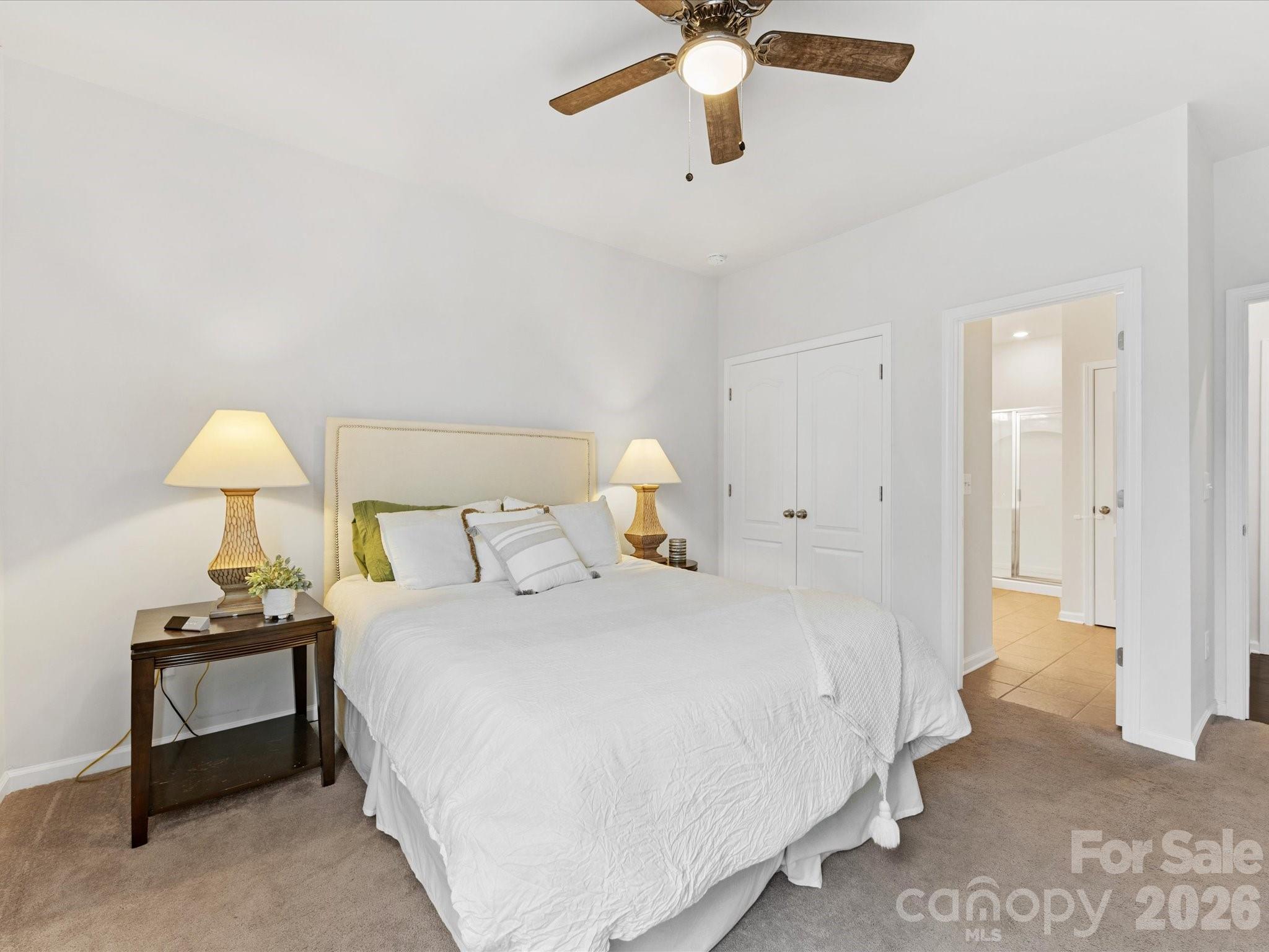 4261 Coachwhip Avenue Lancaster, SC 29720 - Photo 16 of 42 a bedroom with a bed and a lamp