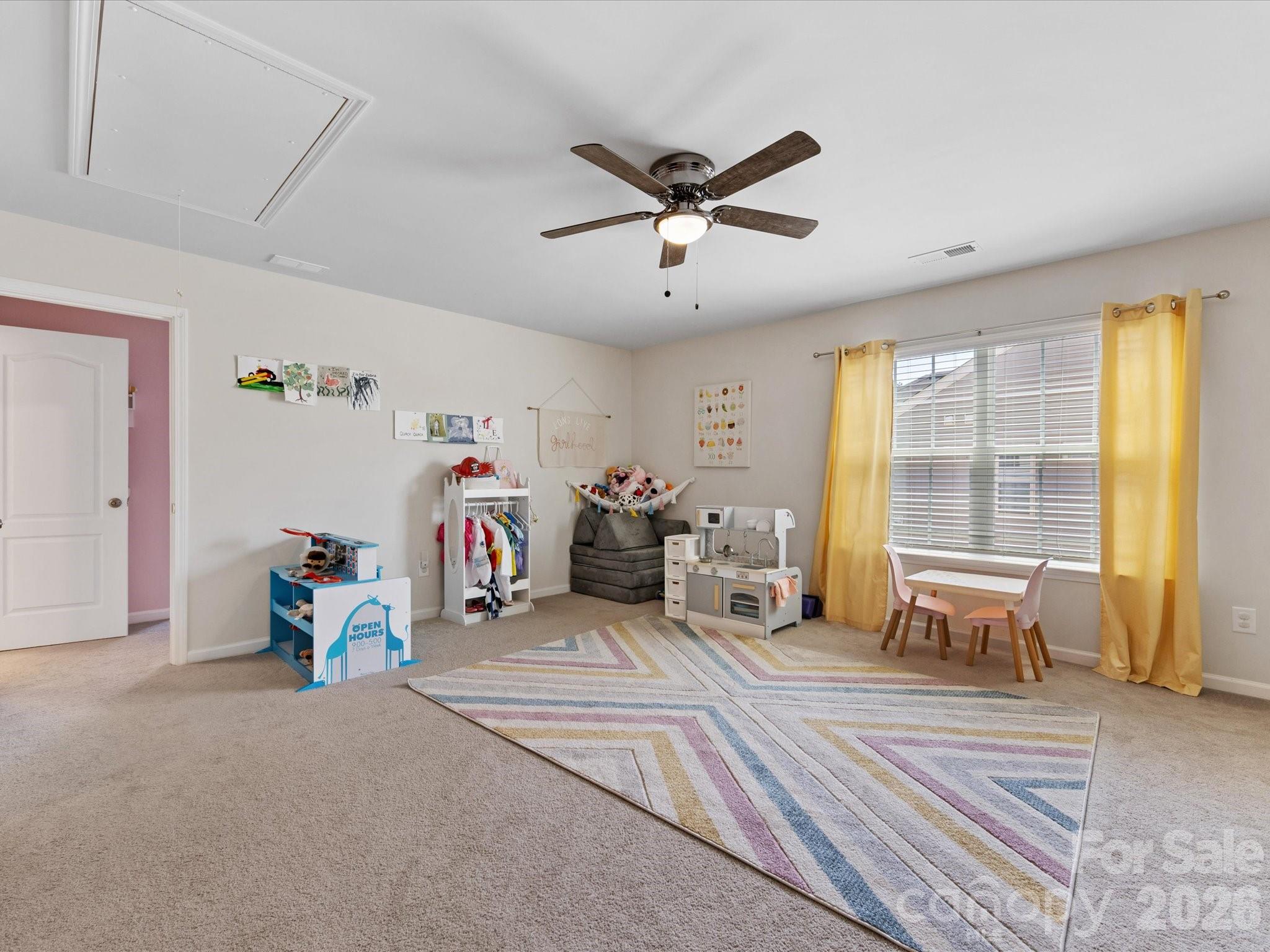 4261 Coachwhip Avenue Lancaster, SC 29720 - Photo 19 of 42 a living room with furniture and a large window