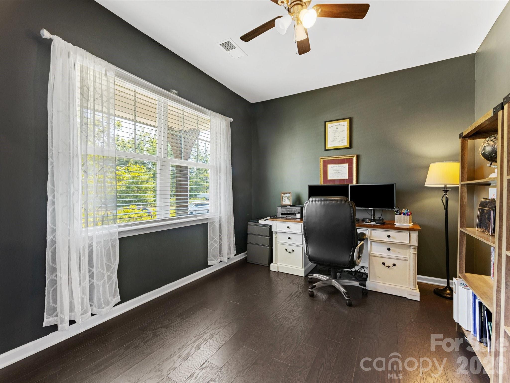 4261 Coachwhip Avenue Lancaster, SC 29720 - Photo 2 of 42 a view of a workspace with furniture and a window