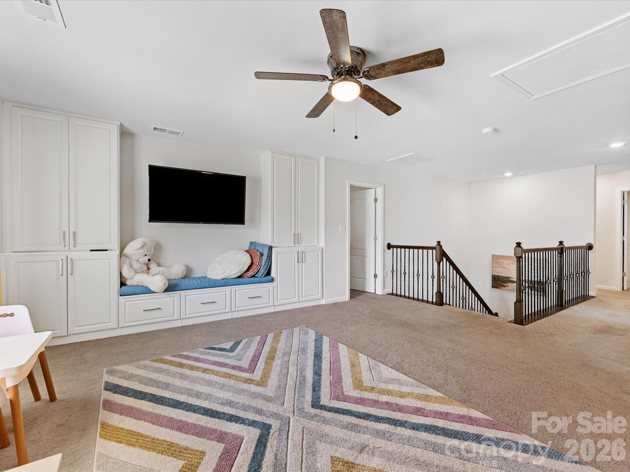 4261 Coachwhip Avenue Lancaster, SC 29720 - Photo 21 of 42 a living room with furniture and a flat screen tv