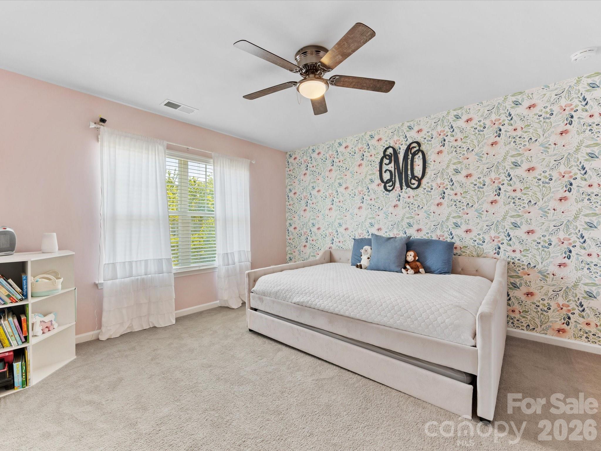 4261 Coachwhip Avenue Lancaster, SC 29720 - Photo 26 of 42 a bedroom with a bed and a large window with the outer view