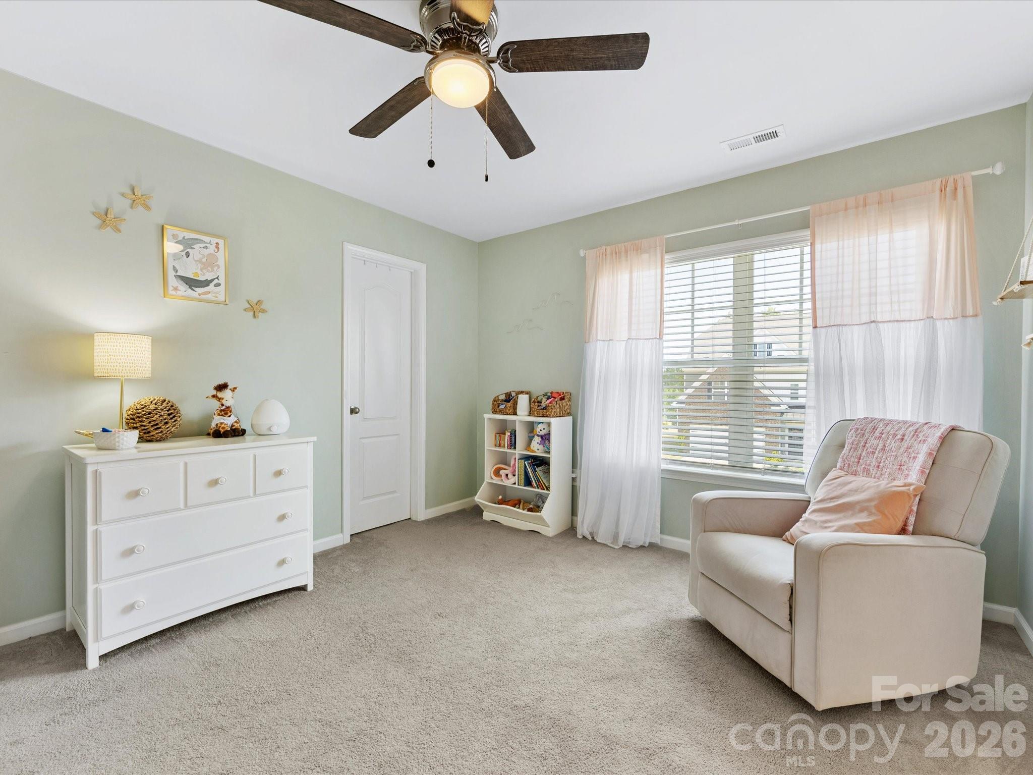4261 Coachwhip Avenue Lancaster, SC 29720 - Photo 29 of 42 a living room with furniture and windows