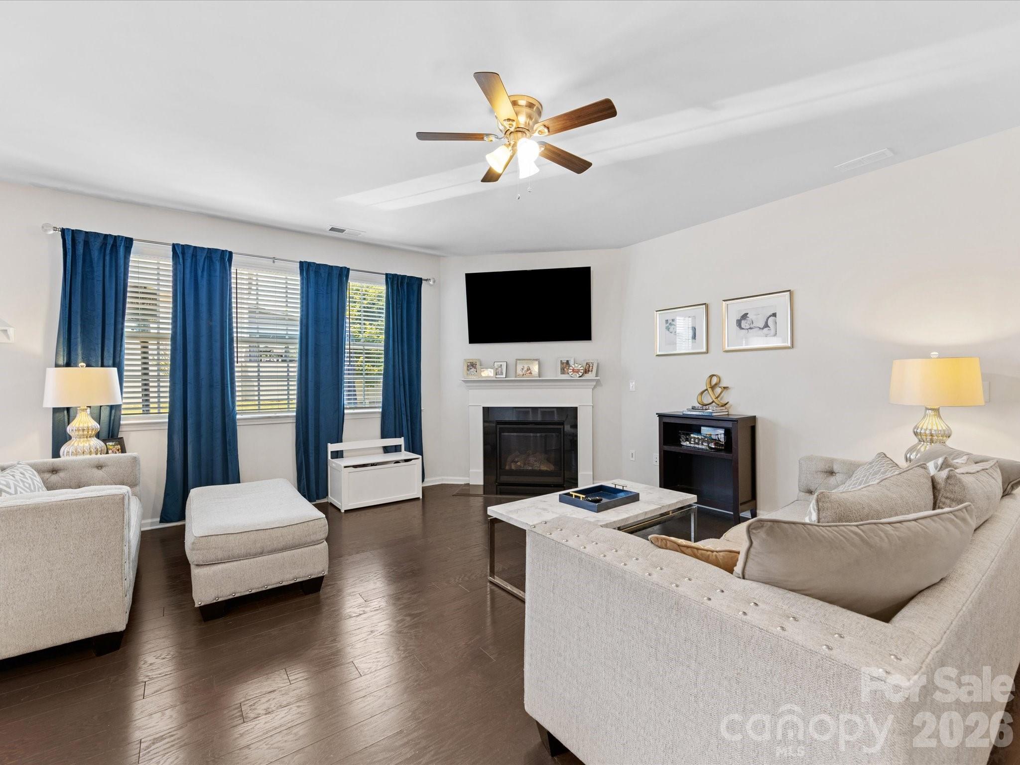 4261 Coachwhip Avenue Lancaster, SC 29720 - Photo 9 of 42 a living room with furniture fireplace and a large window