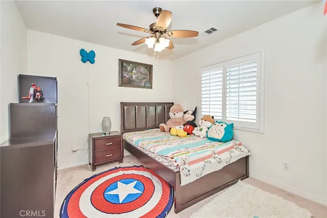 a living room with granite countertop furniture and a dining table