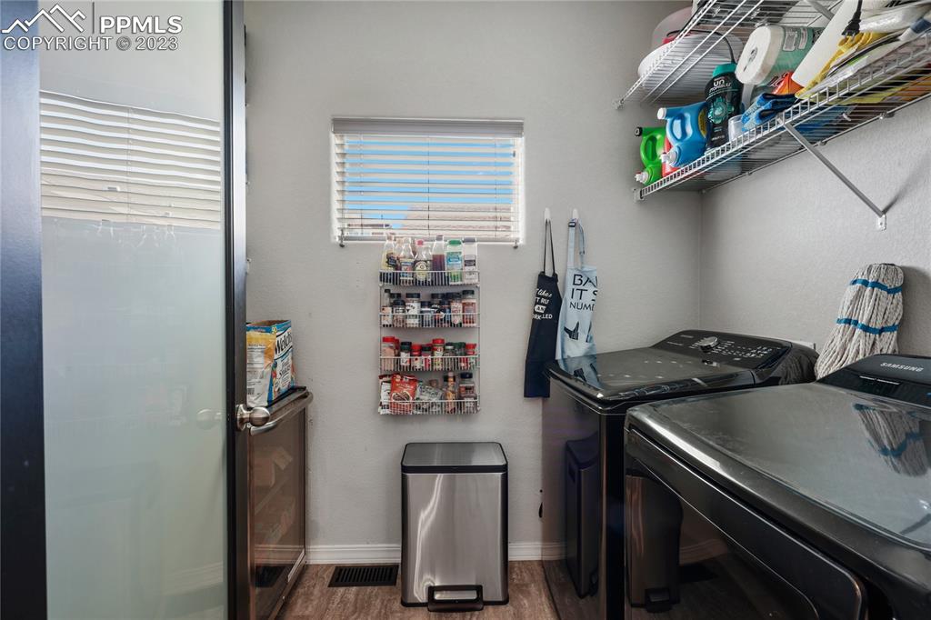 2016 Paddy Grove Colorado Springs, CO 80910 - Photo 19 of 39 a kitchen with a stove and a window