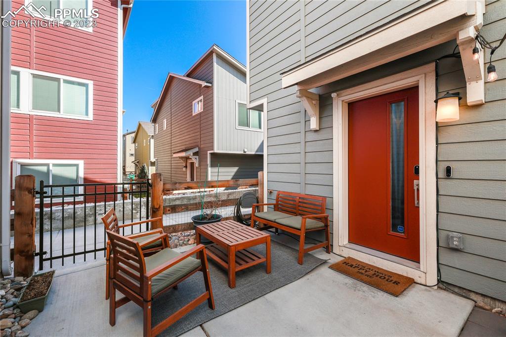 2016 Paddy Grove Colorado Springs, CO 80910 - Photo 32 of 39 a backyard of a house with barbeque oven table and chairs