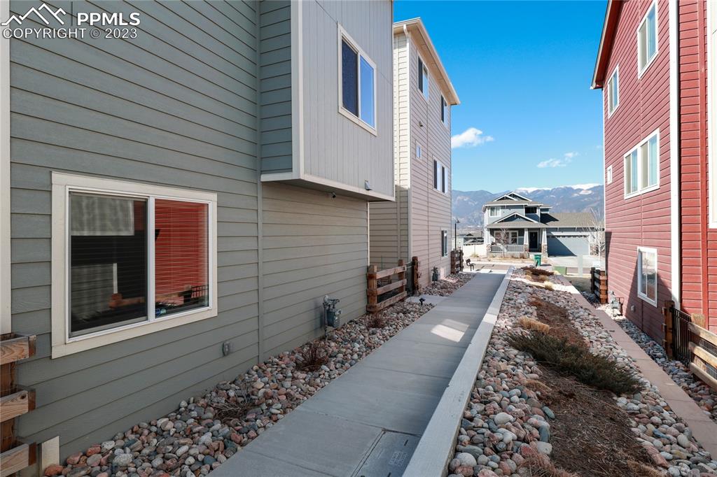 2016 Paddy Grove Colorado Springs, CO 80910 - Photo 35 of 39 a view of a house with a cars park side of a road