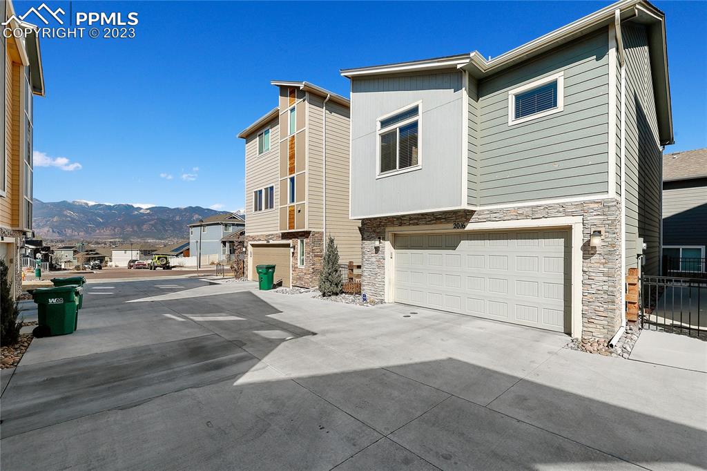 2016 Paddy Grove Colorado Springs, CO 80910 - Photo 39 of 39 a view of a street with a house