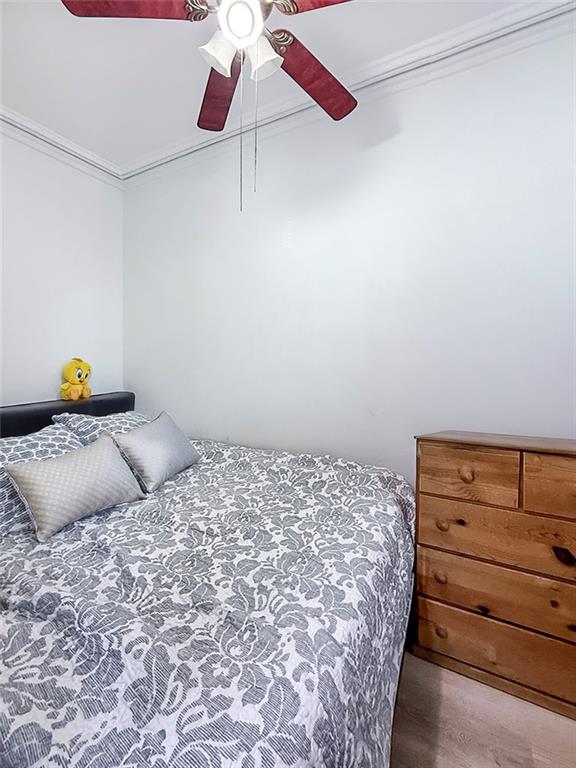 124 Hall Street Brooklyn, NY 11205 - Photo 15 of 31 a bedroom with a bed and window