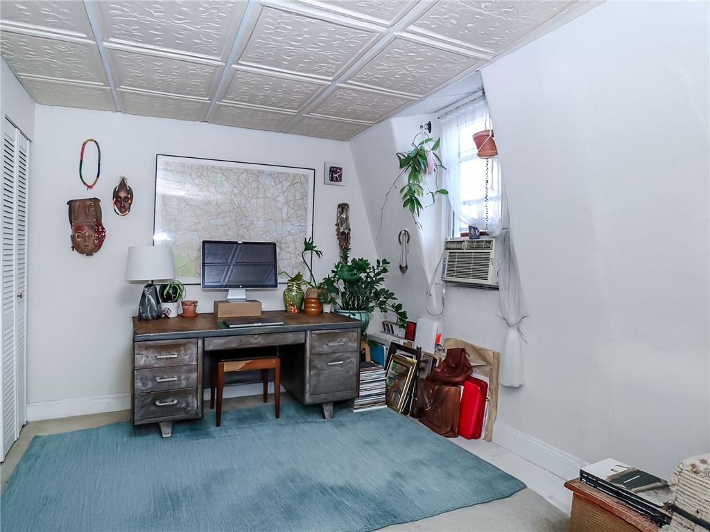 124 Hall Street Brooklyn, NY 11205 - Photo 18 of 31 a view of a workspace with furniture