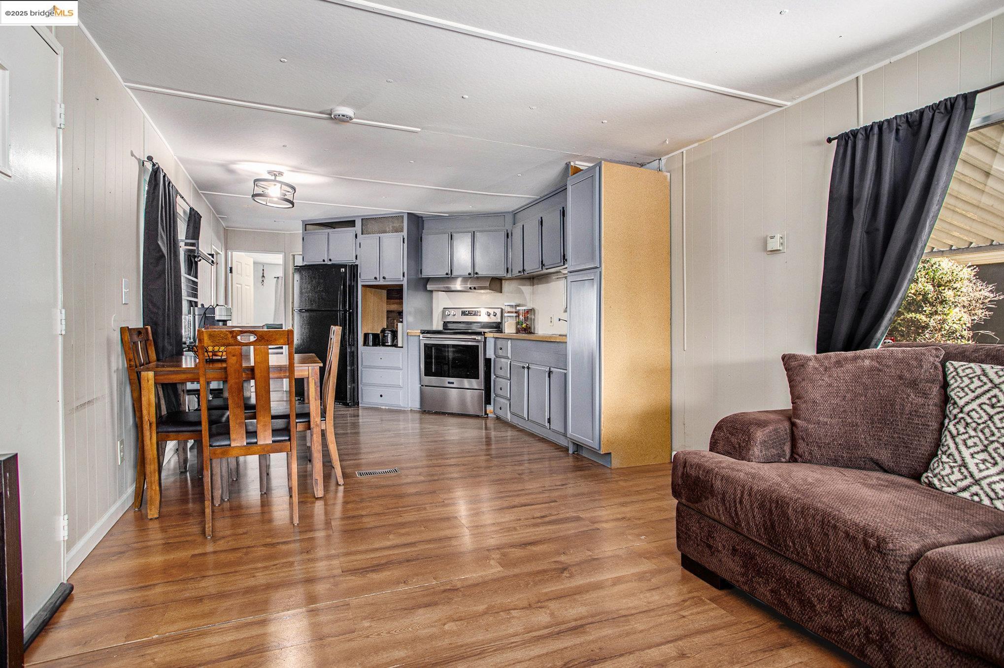 3301 Buchanan Road, Unit 118 Antioch, CA 94509 - Photo 5 of 15 Living room featuring light wood-style flooring
