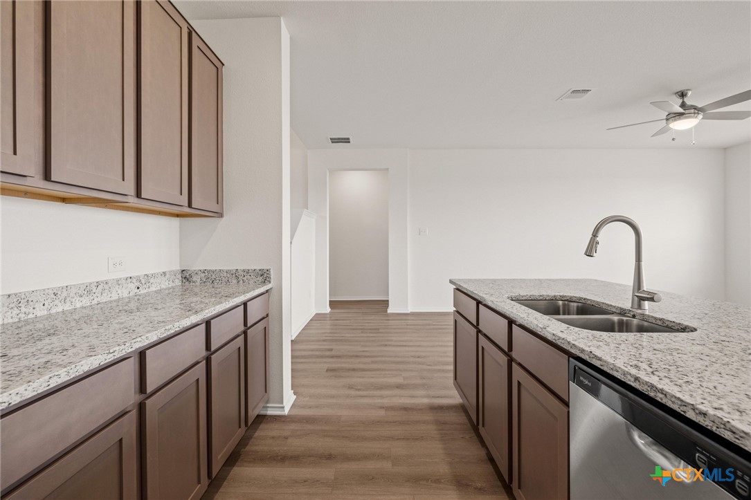 722 Ryan Street Belton, TX 76513 - Photo 11 of 37 Kitchen boasts Shaker-style cabinets