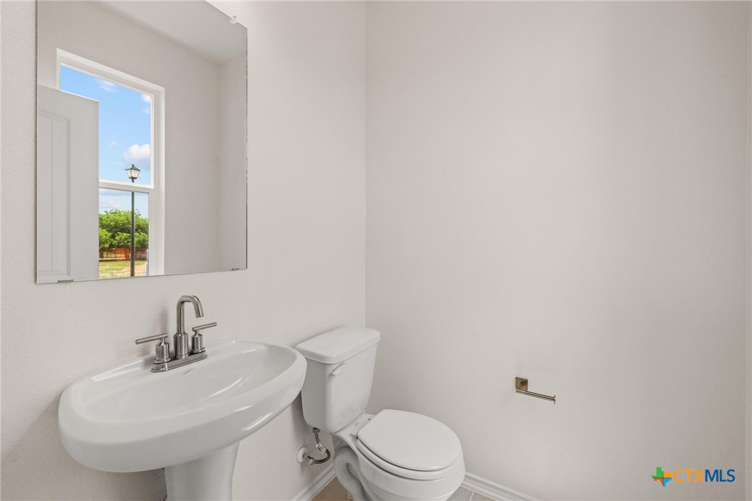 722 Ryan Street Belton, TX 76513 - Photo 28 of 37 Downstairs half bath