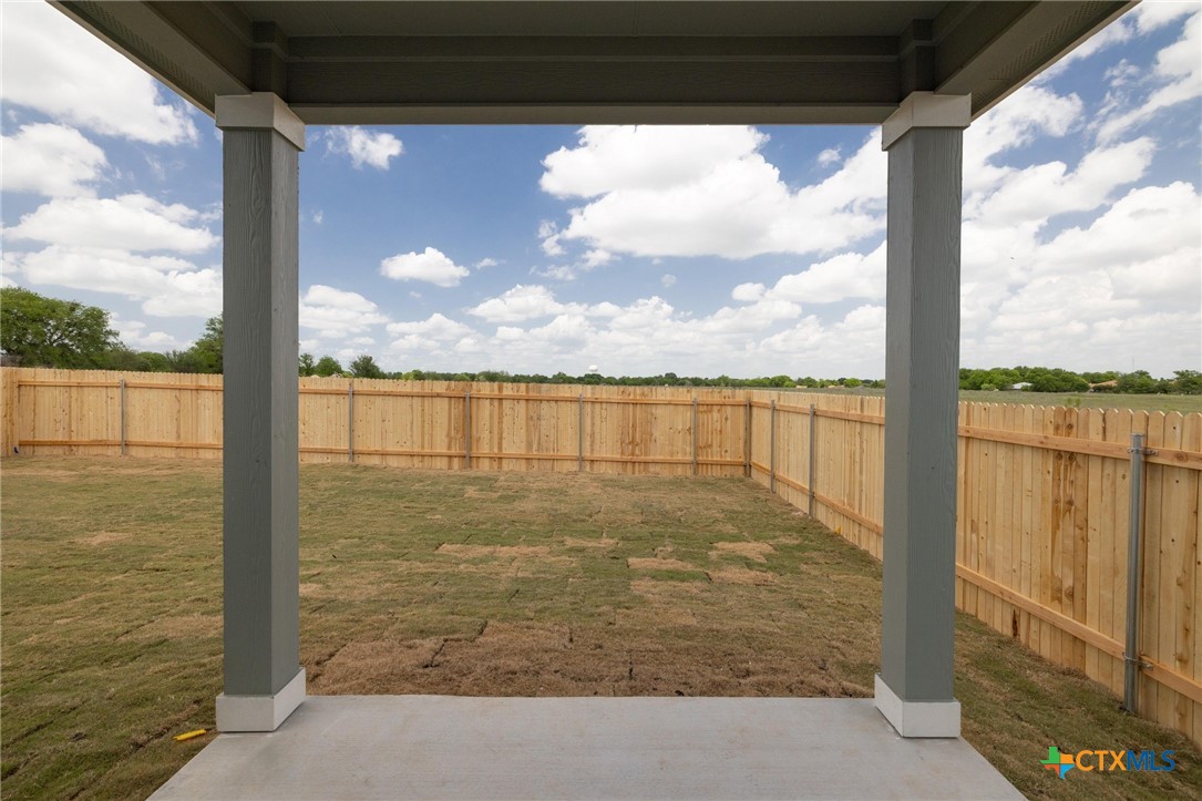 722 Ryan Street Belton, TX 76513 - Photo 30 of 37 Relax outdoors on the covered back patio.
