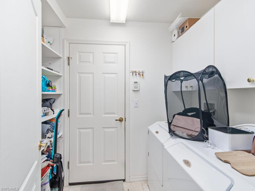 21695 Windham Run Estero, FL 33928 - Photo 15 of 42 a bathroom with a sink and a mirror