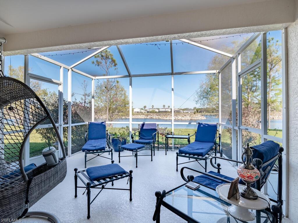 21695 Windham Run Estero, FL 33928 - Photo 16 of 42 a view of a livingroom with furniture and a window