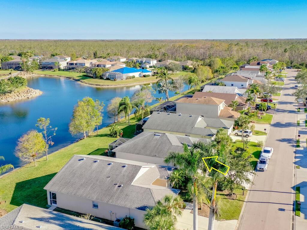 21695 Windham Run Estero, FL 33928 - Photo 21 of 42 an aerial view of a houses with a lake view