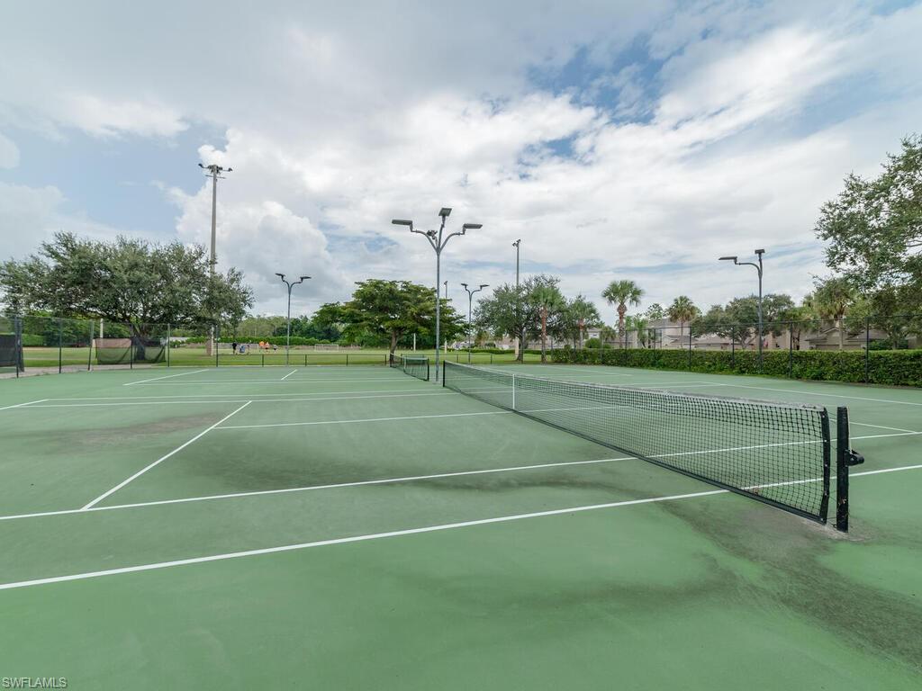 21695 Windham Run Estero, FL 33928 - Photo 37 of 42 a view of a tennis court