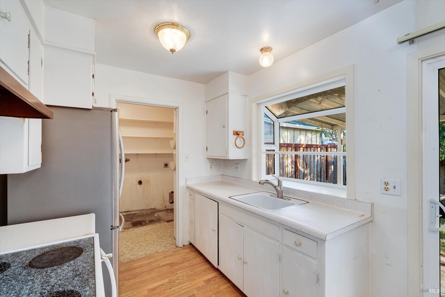 5158 Parkhurst Drive Santa Rosa, CA 95409 - Photo 14 of 40 a bathroom with a sink and a mirror